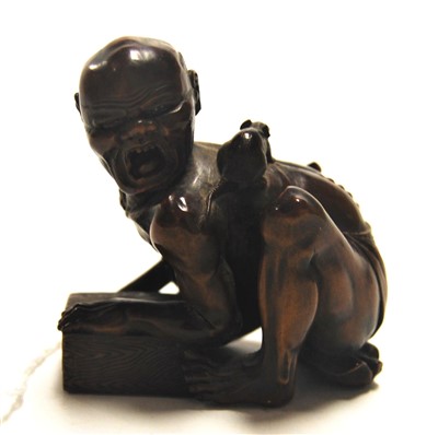 Lot 284 - A Japanese Meiji period softwood netsuke,...