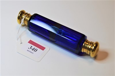 Lot 340 - A Victorian facet cut blue glass double ended...