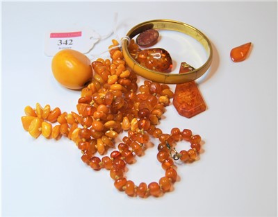 Lot 342 - A natural butterscotch amber style ladies...