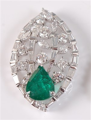 Lot 2147 - A white metal, emerald and diamond leaf shaped...