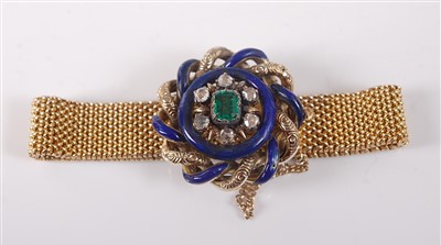 Lot 2149 - A yellow metal bracelet, featuring a centre...