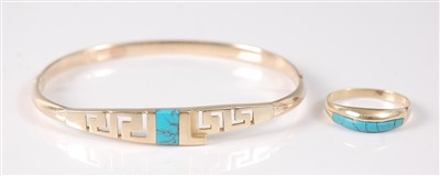 Lot 2171 - A yellow metal bangle and ring set, the oval...