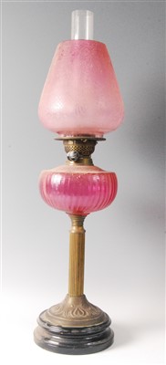 Lot 2282 - A Victorian brass pedestal oil lamp, having...