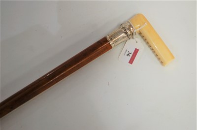 Lot 36 - A Victorian walking cane, having a mallacca...