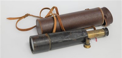 Lot 111 - An early 20th century brass and leather clad...