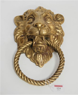 Lot 124 - A large cast brass doorknocker in the form of...