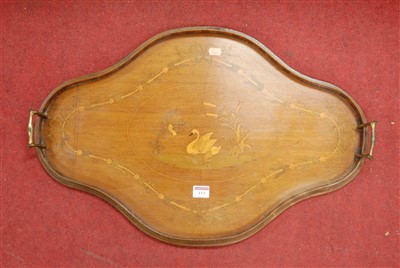 Lot 153 - An Edwardian mahogany drinks tray of shaped...