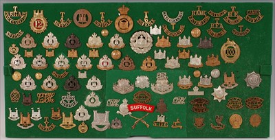 Lot 102 - A collection of British Army cap badges, collar badges and insignia