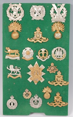Lot 107 - A collection of British Army cap badges and insignia