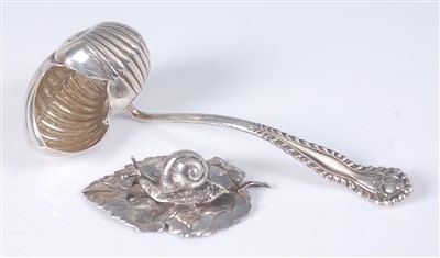 Lot 2108 - A continental 800 silver caddy spoon, the bowl...