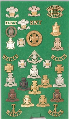 Lot 113 - A collection of British Army cap badges and insignia