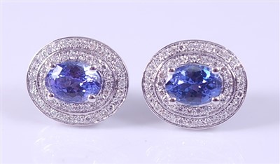 Lot 2175 - A pair of white metal, tanzanite and diamond...
