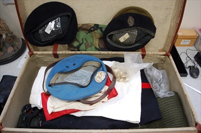 Lot 233 - A canvas and leather bound military suitcase