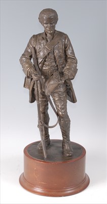 Lot 78 - A modern bronzed resin figure of a Red Coat