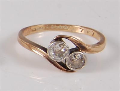 Lot 2227 - A yellow and white metal diamond two-stone...