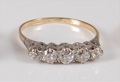 Lot 2136 - A yellow and white metal diamond five-stone...