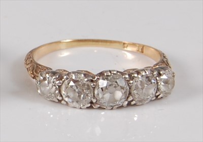 Lot 1202 - An Edwardian yellow and white metal diamond...