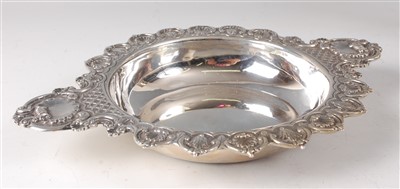 Lot 2077 - A late Victorian silver quaiche, having a...