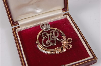 Lot 2143 - A yellow and white metal Elizabeth II Royal...