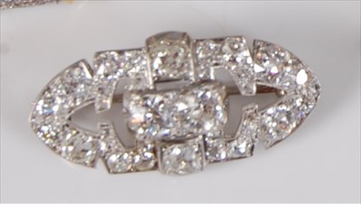 Lot 2140 - An Art Deco white metal diamond set lozenge...