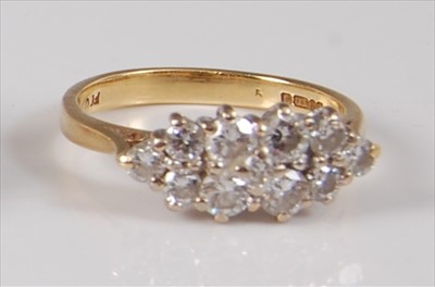 Lot 2185 - An 18ct yellow and white gold diamond marquise...