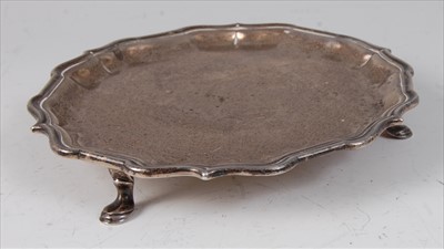 Lot 2115 - A George II silver card waiter, having a...