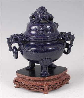 Lot 2336 - A Chinese carved blue glass censor and cover,...
