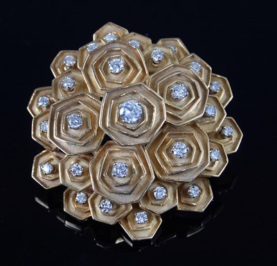 Lot 2151 - An 18 carat gold and diamond set brooch by...