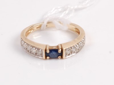 Lot 343 - A contemporary 9ct gold sapphire and diamond...