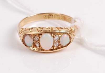 Lot 341 - A vintage 18ct gold opal and diamond ring...