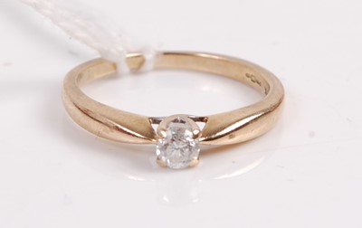 Lot 345 - A 9ct gold diamond solitaire ring, the four...