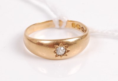 Lot 347 - An 18ct gold diamond solitaire ring, the old...