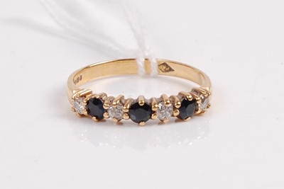 Lot 346 - A contemporary 18ct gold, sapphire and diamond...