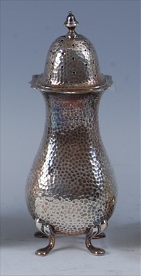 Lot 101 - An Art Nouveau silver lighthouse sugar caster,...