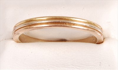 Lot 2050 - An 18ct Cartier 'Trinity' ring, comprising...