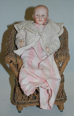 Lot 495 - A Gebruder Heubach bisque head doll, having...
