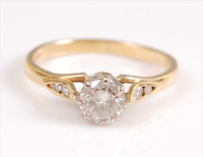 Lot 2109 - An 18ct yellow and white gold diamond single...