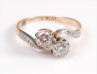 Lot 2110 - A yellow and white metal diamond two stone...