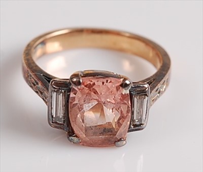 Lot 2129 - A yellow and white metal, pink sapphire and...