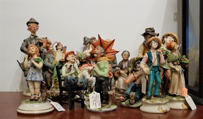 Lot 19 - A collection of Capo di Monte figures, to...