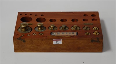 Lot 29 - A cased set of graduated brass scientific...
