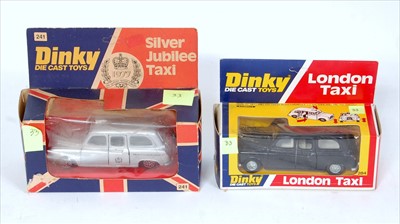 Lot 489 - A Dinky Toys taxi window boxed diecast group...