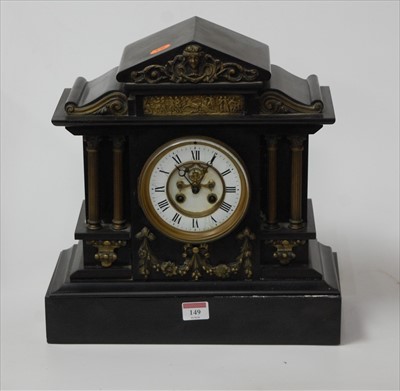 Lot 149 - A Victorian slate mantel clock with brass...