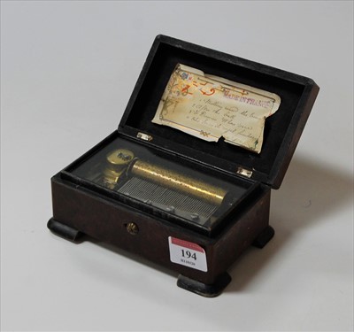 Lot 194 - A French walnut cased travelling music box,...