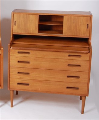 Lot 362 - A 1960s Danish teak bureau, having twin upper...