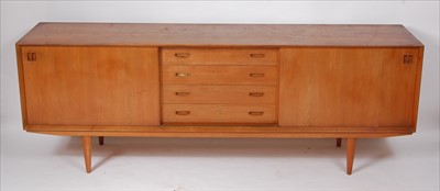 Lot 388 - A 1960s Danish teak long sideboard, having...