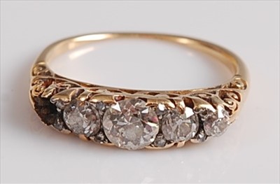 Lot 2143 - A late Victorian yellow metal diamond five...