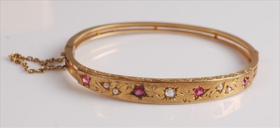 Lot 2135 - A late Victorian yellow metal, ruby, diamond...