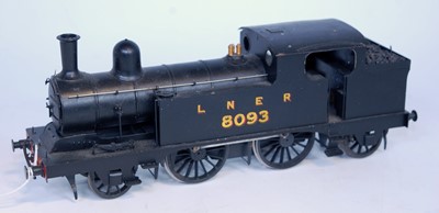 Lot 310 - A brass/whitemetal kit built 2-4-2 tank engine,...