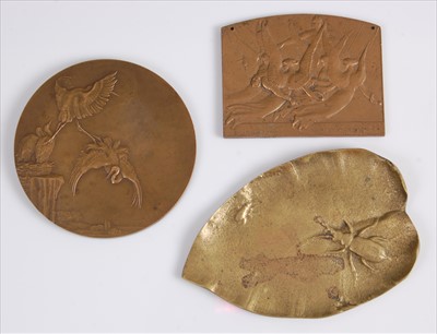 Lot 174 - A circa 1920 circular bronze plaque, depicting...